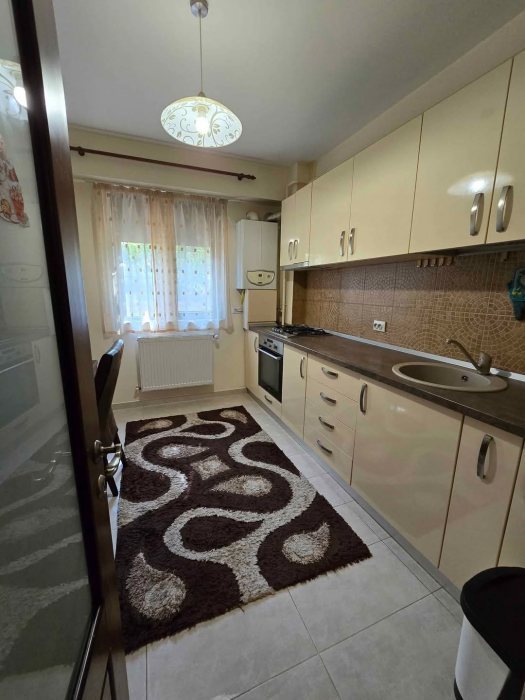 2 camere decomandat Bucium